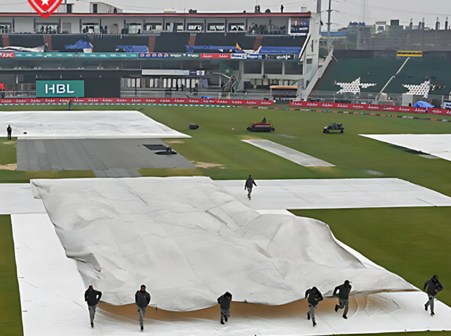 Umpires checking the pitch under covers during rain delay at Rawalpindi.