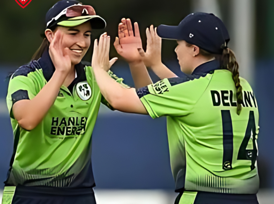 Ireland cricketers Orla Prendergast and Leah Paul celebrate a win on the field.