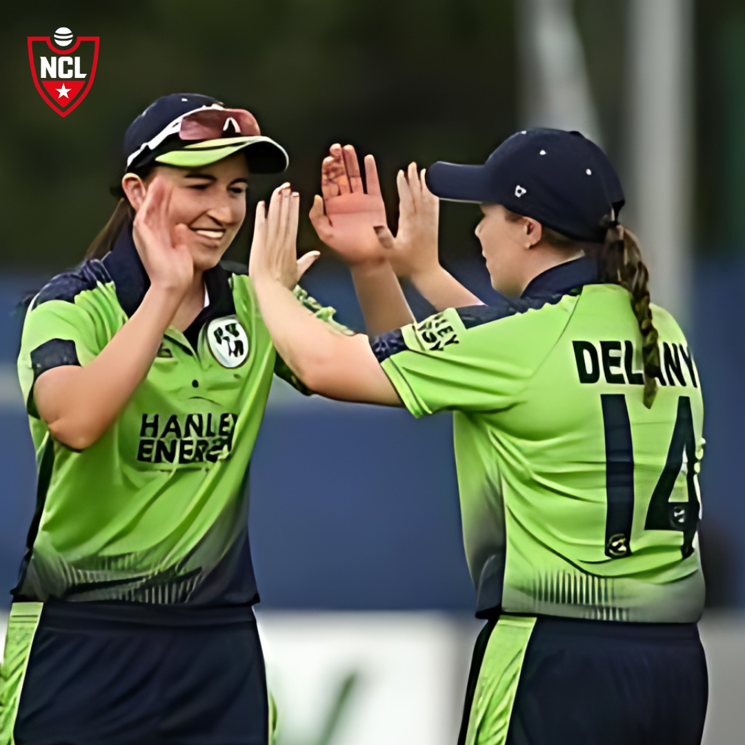 Ireland cricketers Orla Prendergast and Leah Paul celebrate a win on the field.