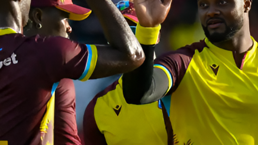 Romario Shepherd and Shamar Joseph celebrating after sealing West Indies' victory against South Africa.