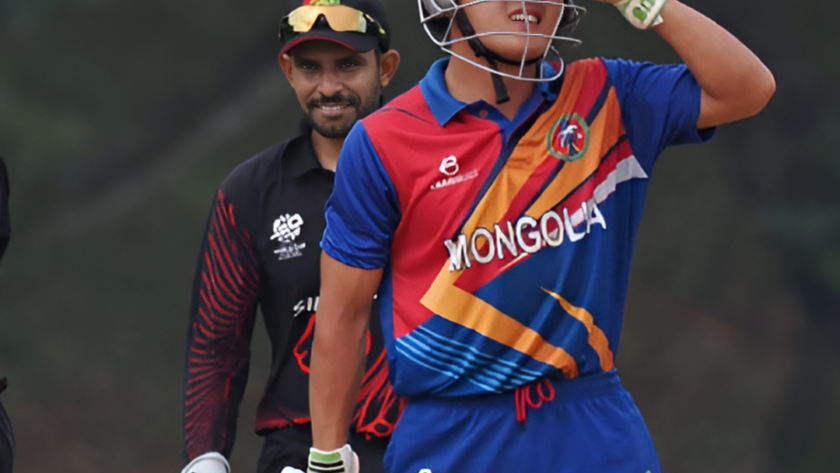 Harsha Bharadwaj celebrating after his six-wicket haul for Singapore.